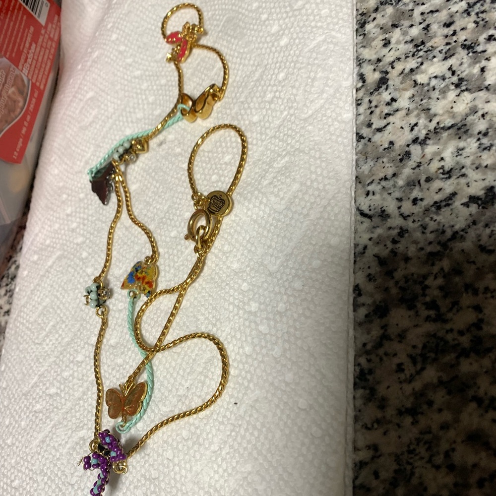 juicy cutur  necklace gold tone 30 inch with butterfly